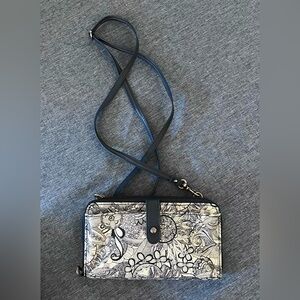 SAKROOTS Smartphone Wallet with Crossbody Strap in Blue and Off-White Floral